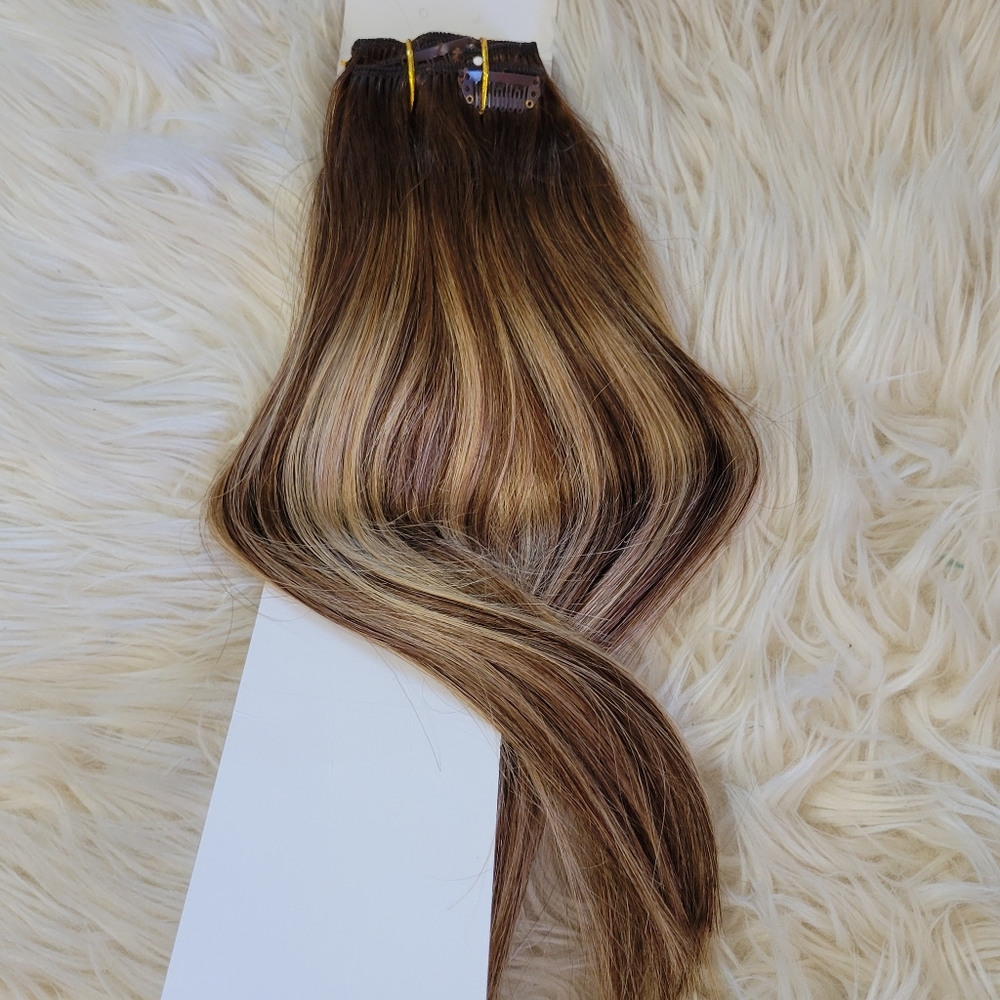 Clip in human hair extensions
